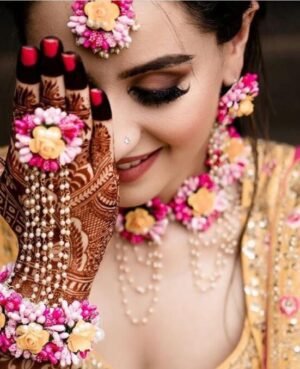 pink and yellow flower jewellery set for haldi for bridal