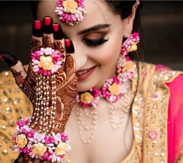 pink and yellow flower jewellery set for haldi for bridal