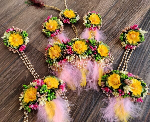 Buy yellow flower set with feathers for haldi function