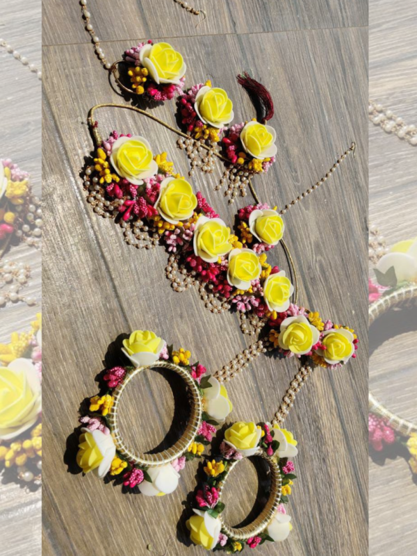 yellow and white haldi heavy floral set with nath