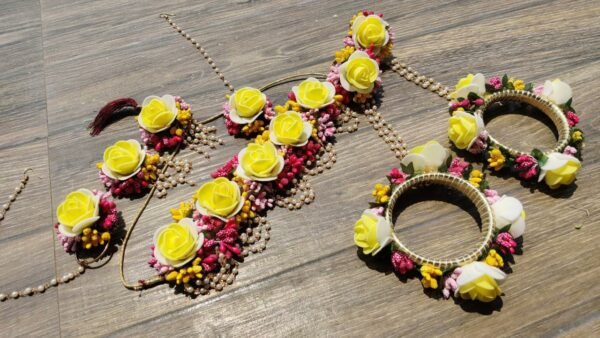 yellow and white haldi heavy floral set with nath