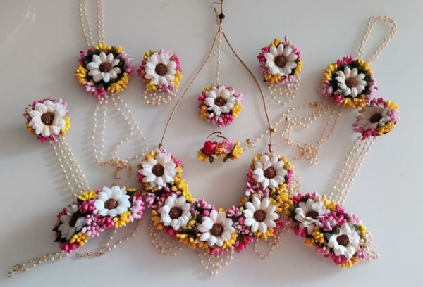 white sunflower with yellow and pink flower jewellery for haldi