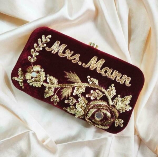 Customized maroon embroidery name clutch